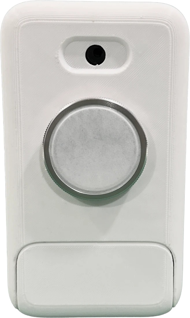 Back of the TeleSync prototype with its stethoscope diaphragm and sensor window